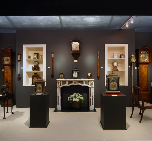 The stand of clock dealer Anthony Woodburn at the LAPDA Fair, which runs in Berkeley Square from Sept. 21 to 25. Image courtesy LAPADA Fair.